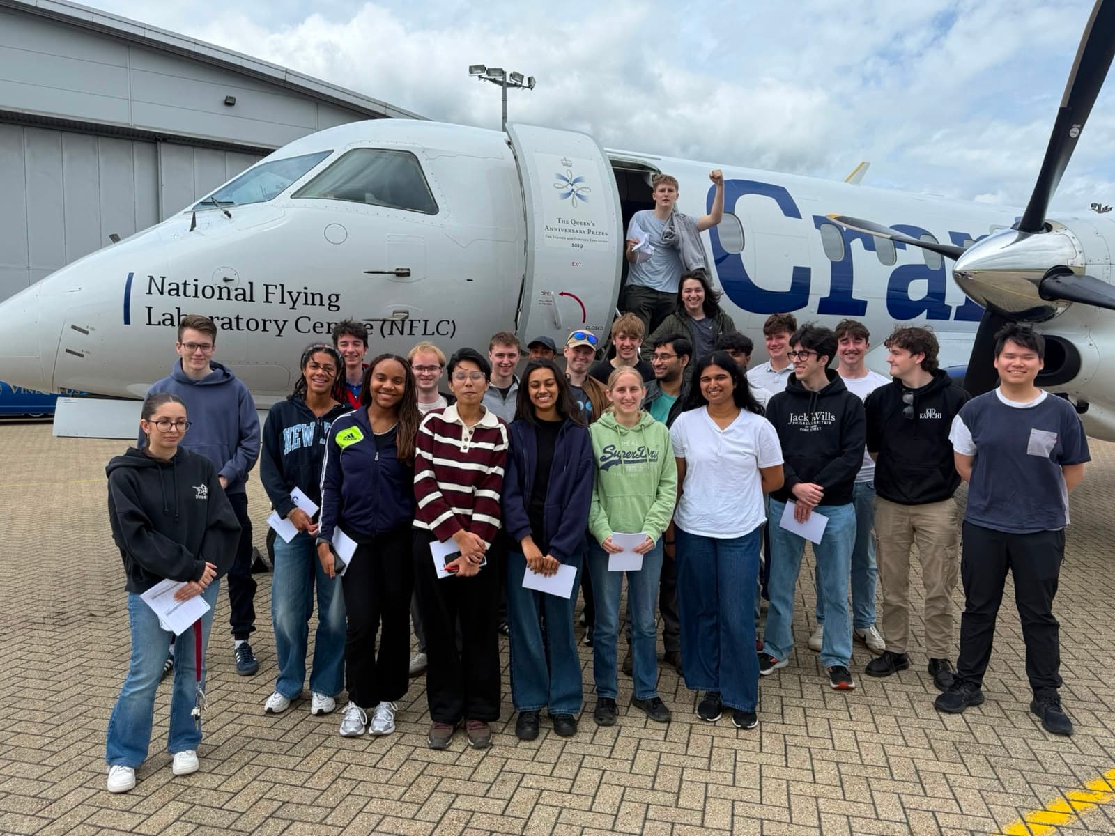Students beside Cranfield University’s instrumented Saab 340B+ Flying Laboratory